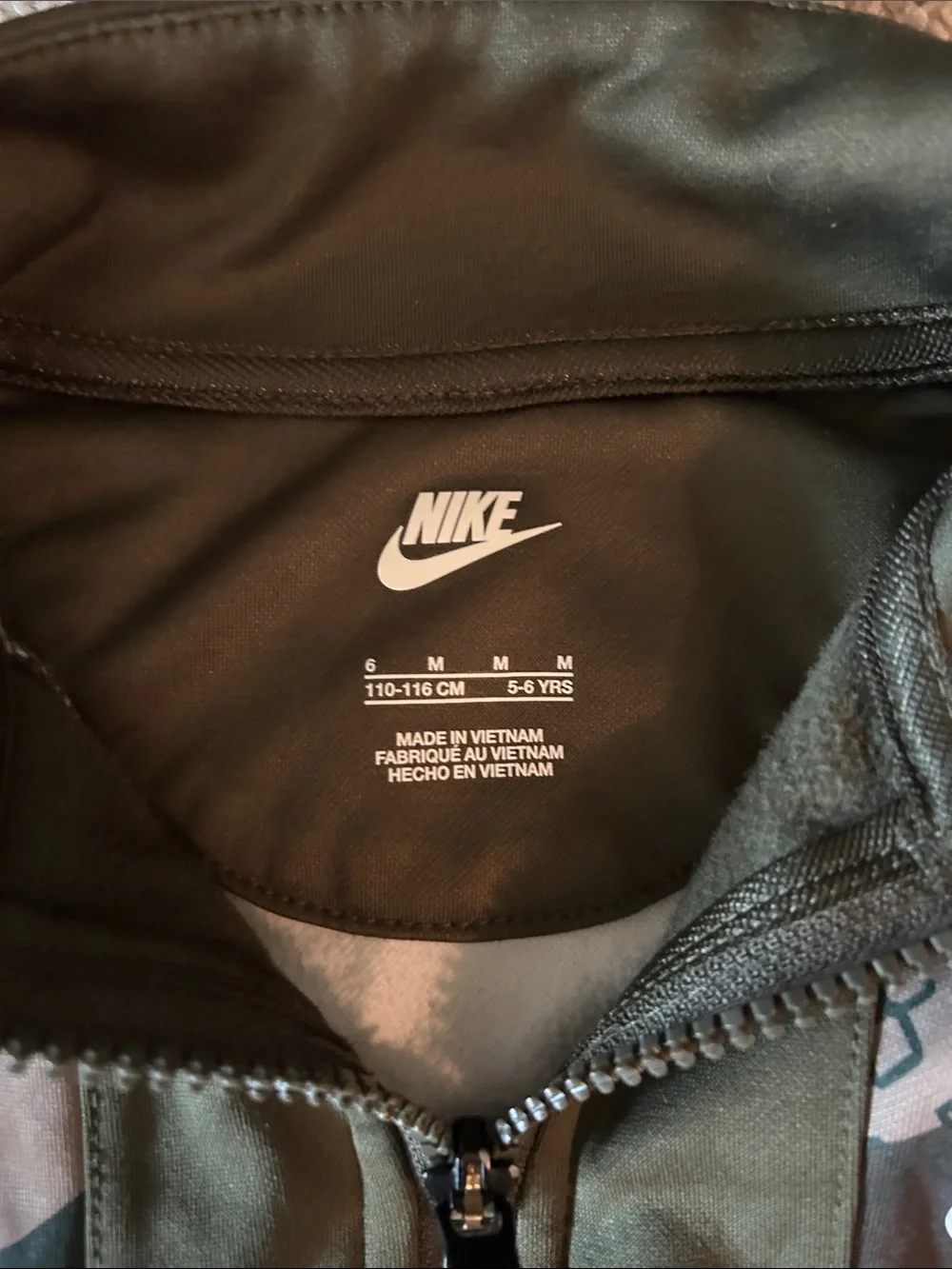 Nike Olive Green Camo Athletic Zip Jacket. Has pockets.
